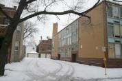 This is the alley where many children jumped from rooms 208, 210 and 212 on December 1, 1958. Barbara Glowacki's candy store has since been torn down, but originally stood next to the house visible at left. The “new” school is somewhat larger than the old school was and covers the old alley, making this alley approximately the same size as the original.