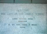 This is the cornerstone of the school built and dedicated in 1960 to replace the destroyed Our Lady of the Angels school. (Photo courtesy of Tom Margherone)