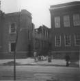 Looking east across Avers Avenue during demolition of the school in February 1959.