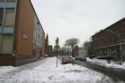 This view is from the corner of Iowa and Avers, looking east on Iowa. The school is on the left, and the former convent is the red brick building on the right. The church is visible on the left at the end of the block beyond the school.